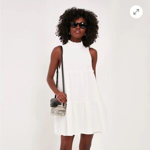 White high neck ruffle dress. Brand new never worn!